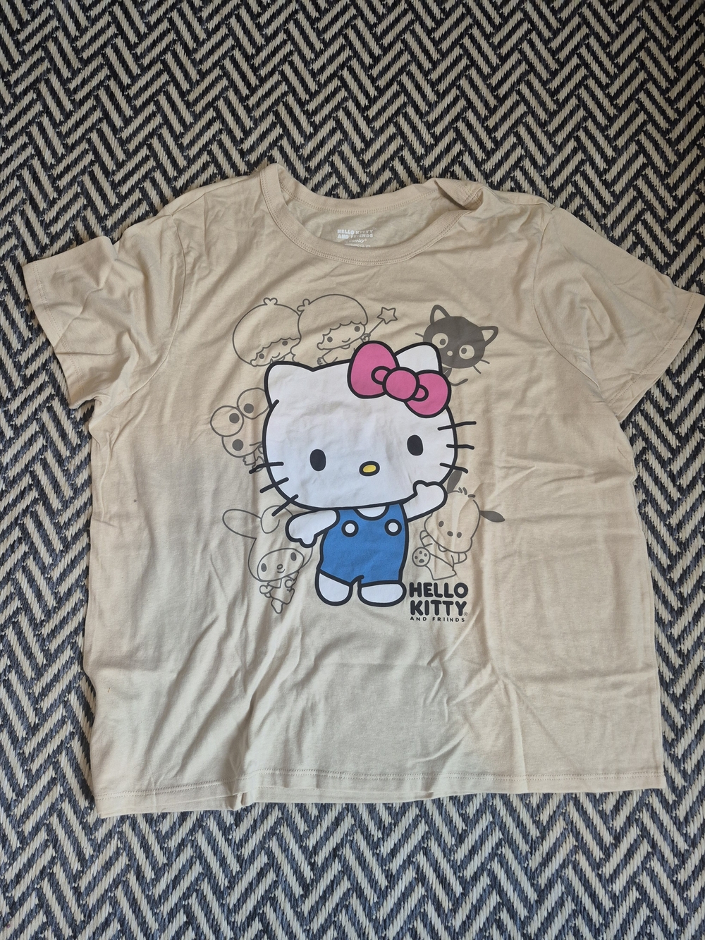 Hello Kitty Beige Tee with Blue Overalls and Pink Bow